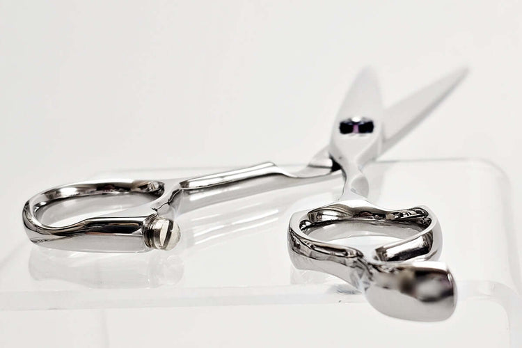 Hair scissors on a white background