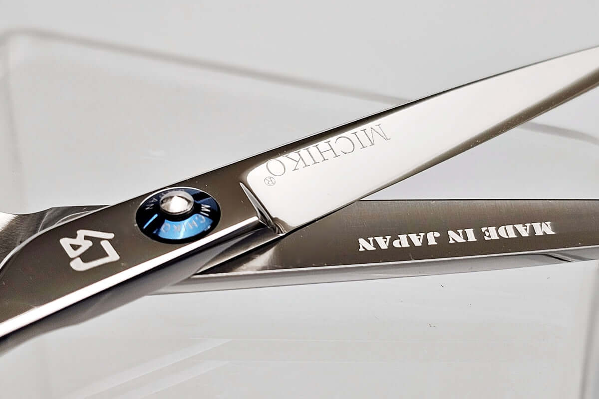 Close-up of a pair of Michiko scissors with 'Made in Japan' text on a white background