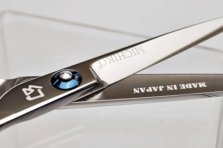 Close-up of a pair of Michiko scissors with 'Made in Japan' text on a white background