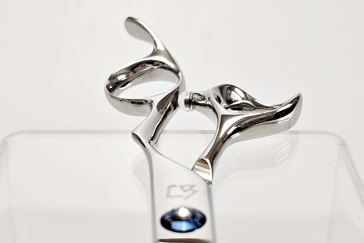 Close-up of Michiko scissors handles on a white background