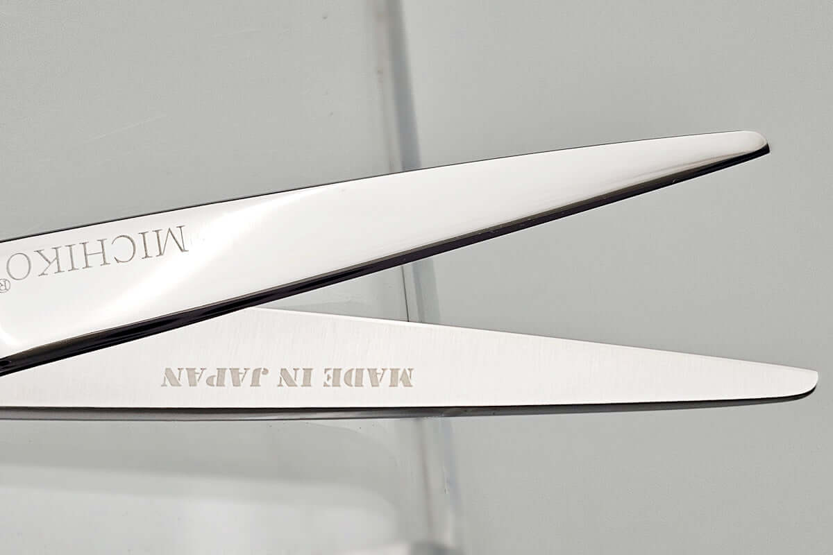 Close-up of a pair of Michiko scissors with 'Made in Japan' text on a white background