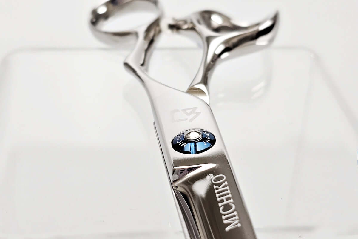 Hair scissors with 'Michiko' branding on a white background