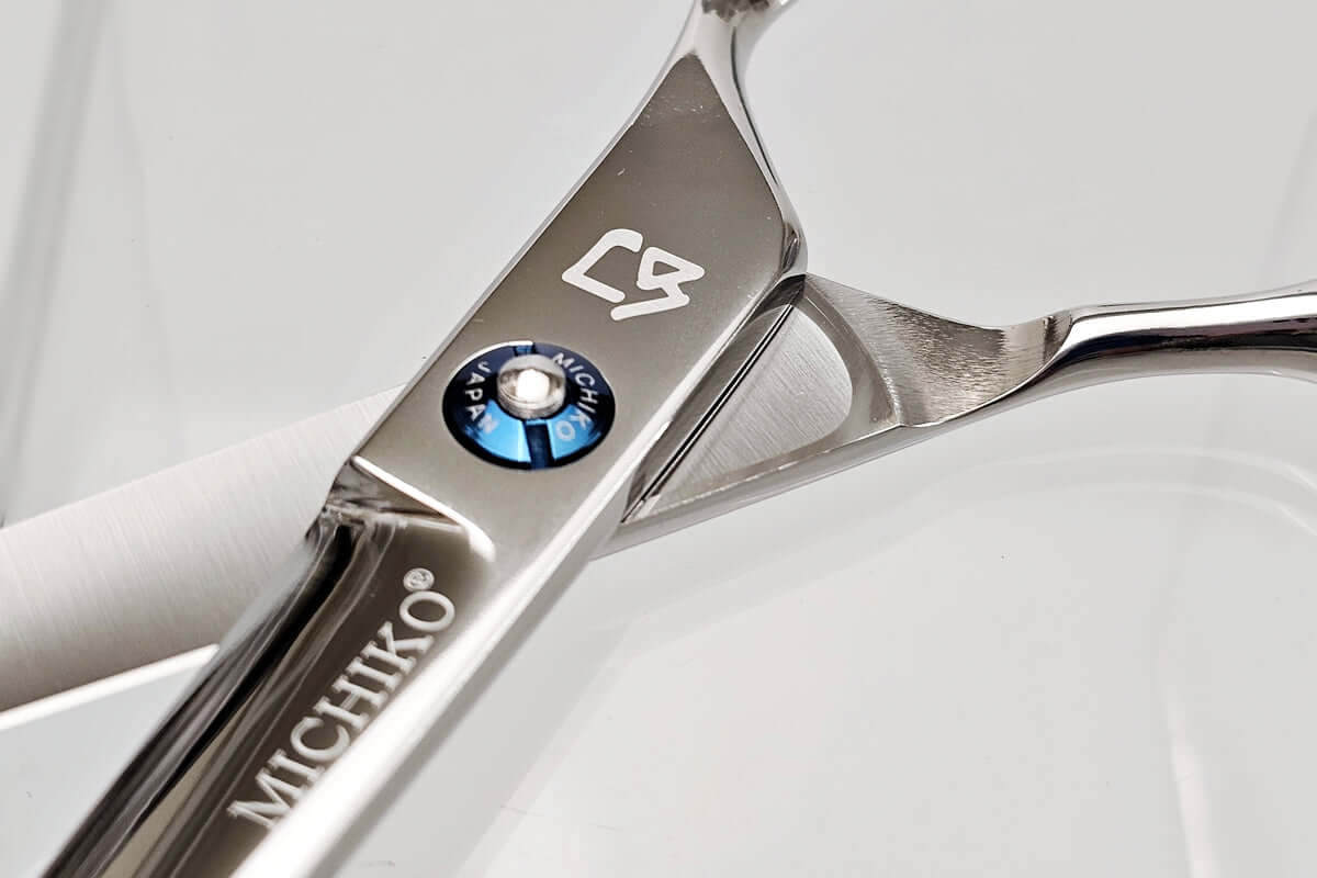 Close-up of a Michiko hair cutting shears on a white background