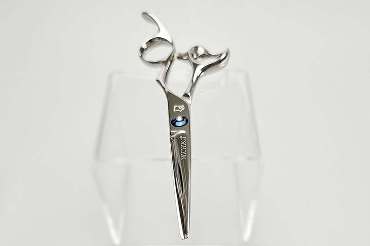 Hair cutting shears with a brand logo on a white background