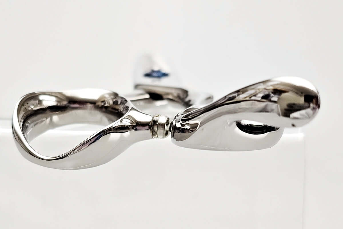 Close-up of hair scissors handle part on a white background