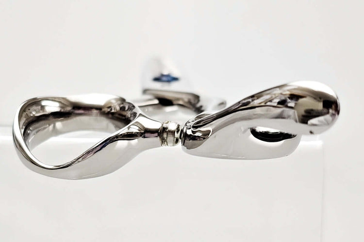Close-up of hair scissors handle part on a white background