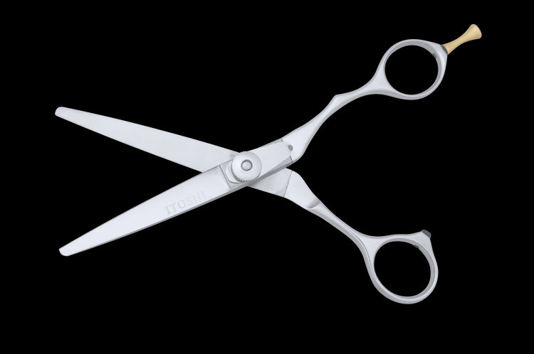 Front view of the TY 600 Tungsten hair cutting scissors in open position, highlighting the sharp tungsten blades and precision engineering.