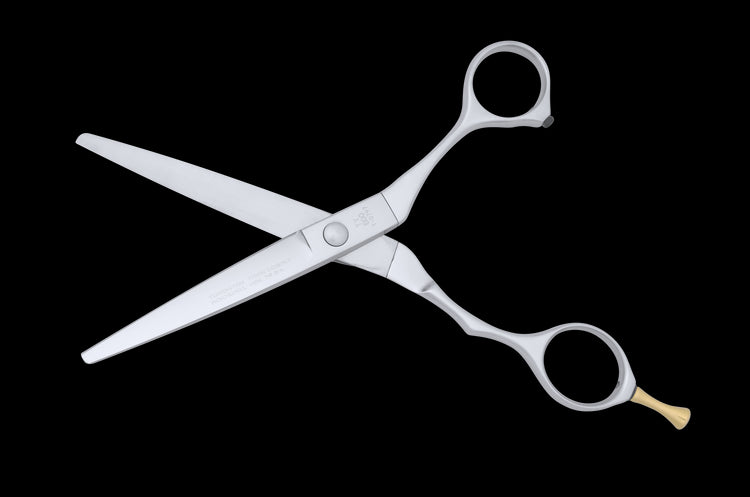 Back view of the TY 600 Tungsten Hair Cutting Scissors in open position, revealing the inner blade surfaces and tension system.